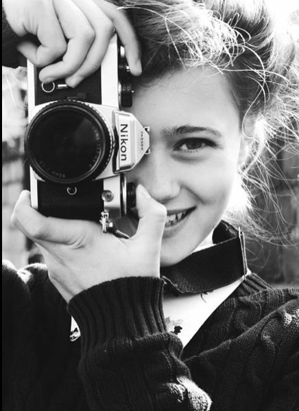 Девушка с фотоаппаратом
